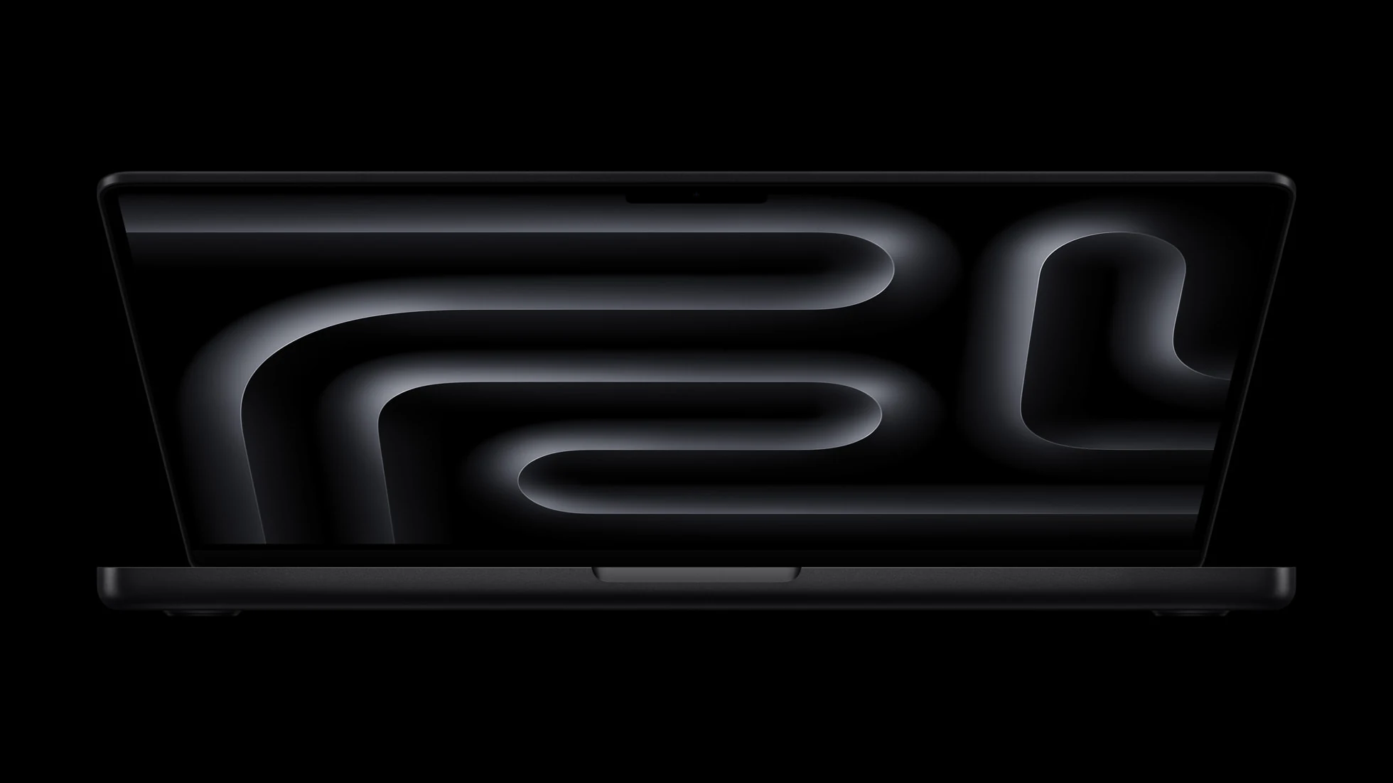 A top-down view of a black MacBook Pro with a sleek design and visible hinge.