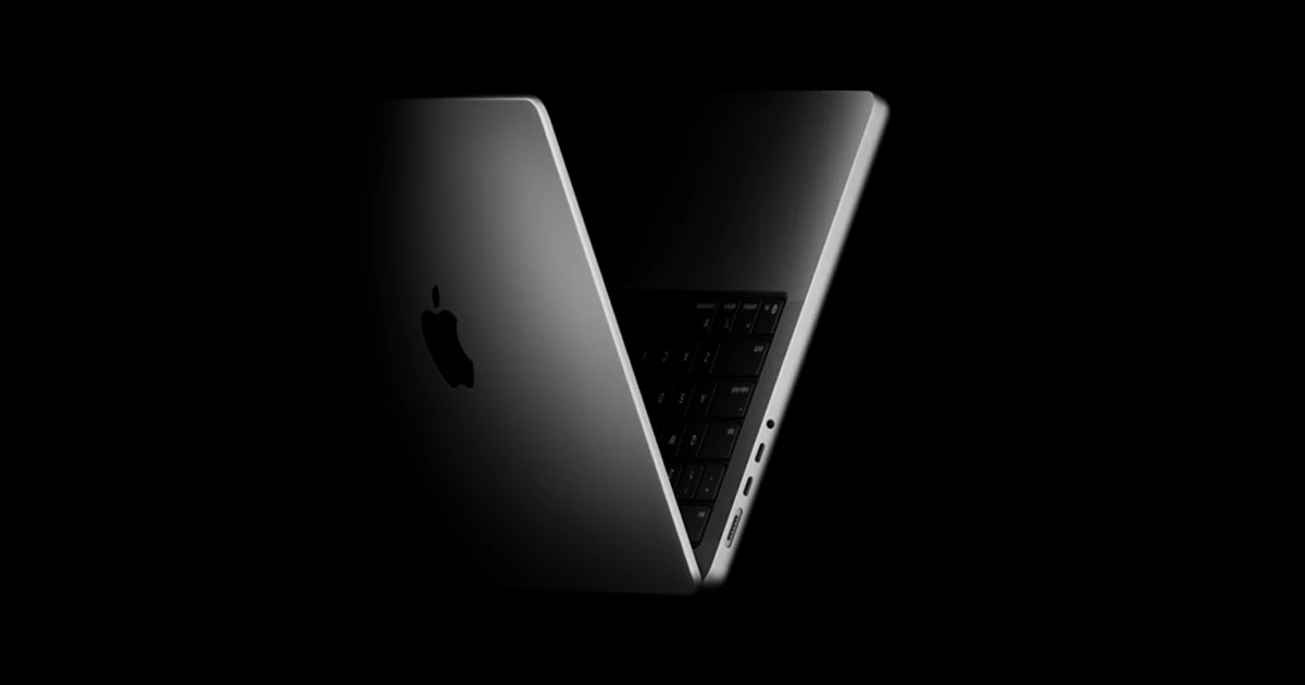 Space Black MacBook Pro with a three-quarter angle showing the back and side ports.