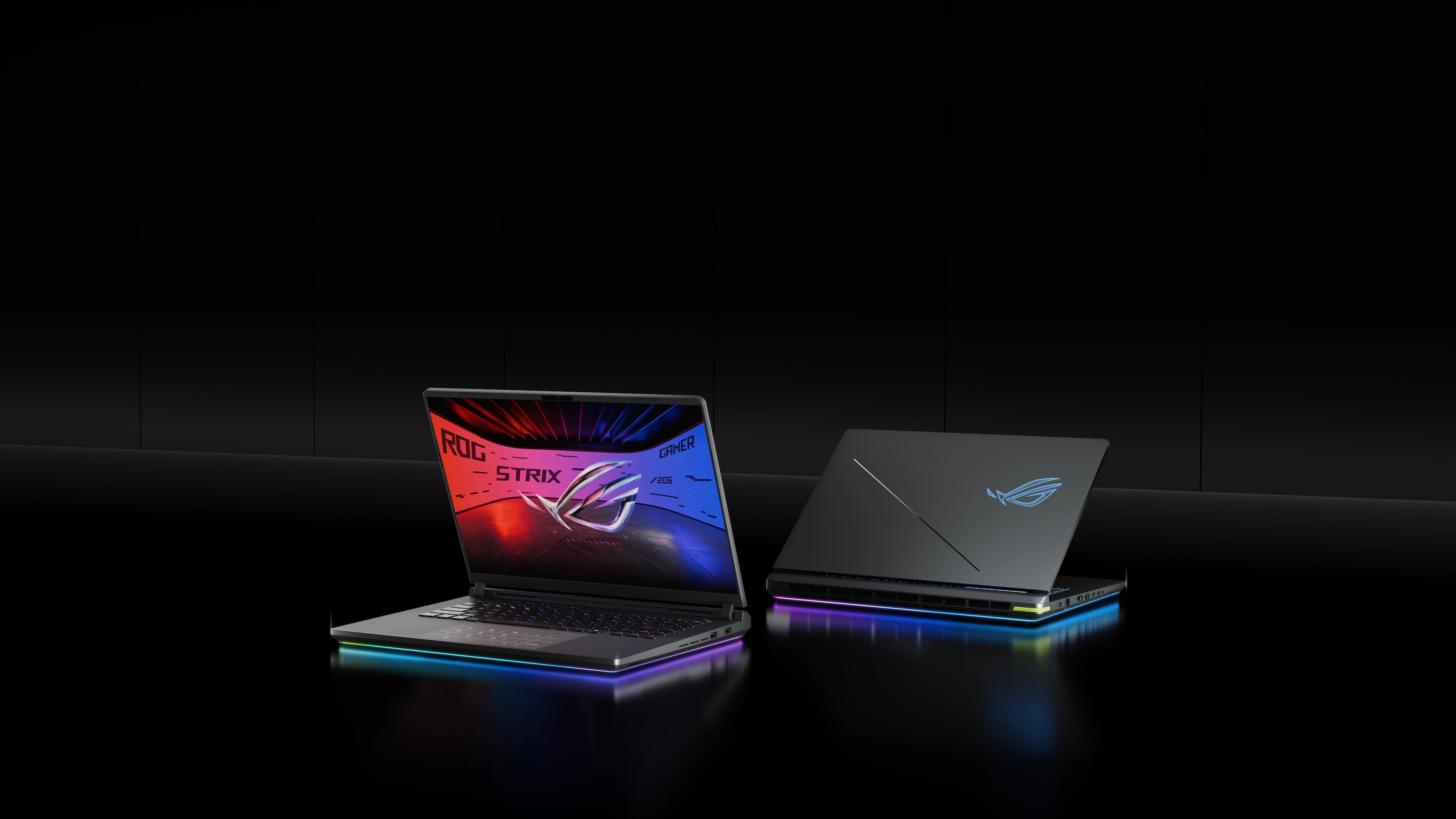 The ASUS ROG Strix G16 (2025) is shown in a three-quarter angle with its screen displaying the ROG logo and branding, featuring RGB lighting on the keyboard.