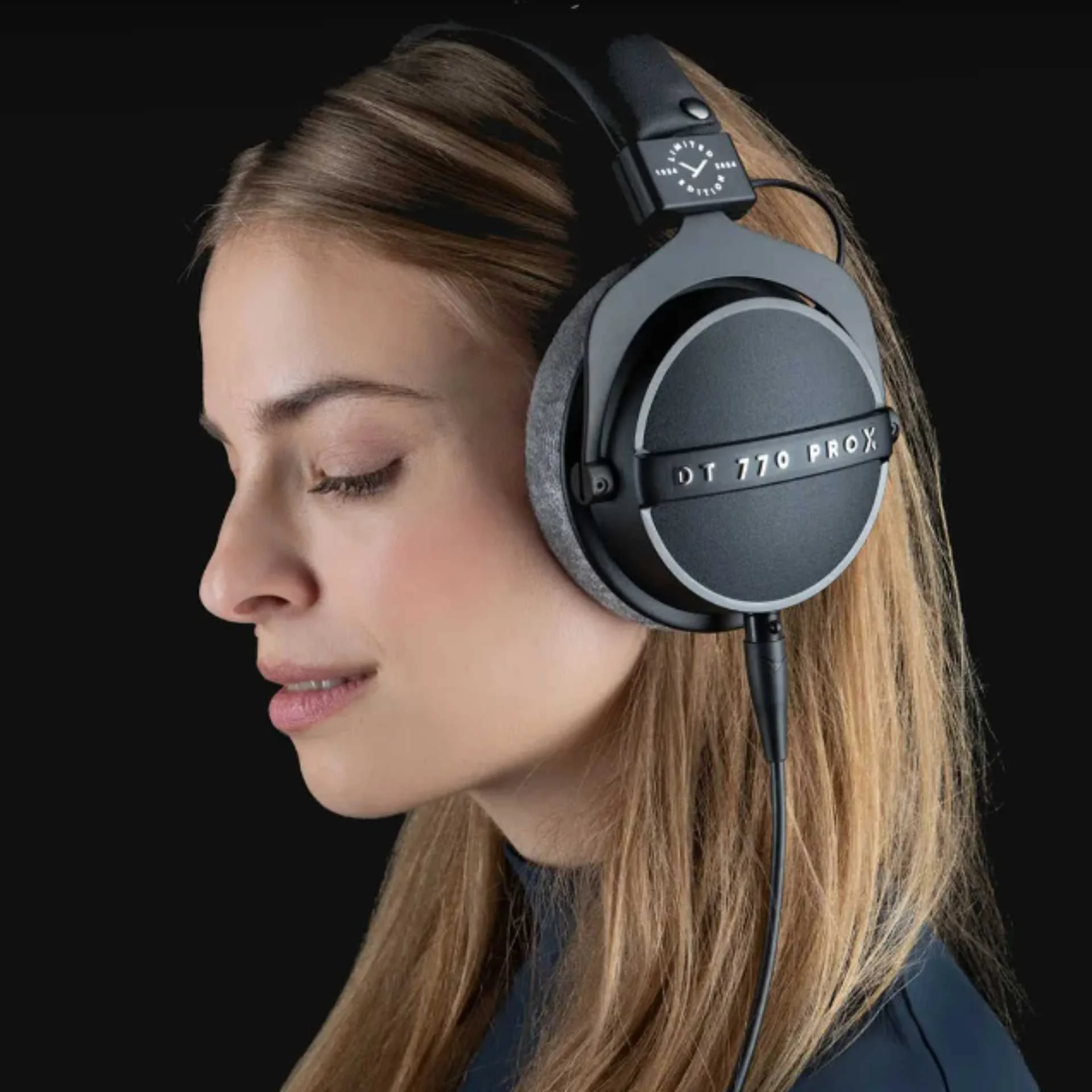 The Beyerdynamic DT 770 Pro headphones are shown in a side profile, with the earcup displaying the model name and limited edition text.