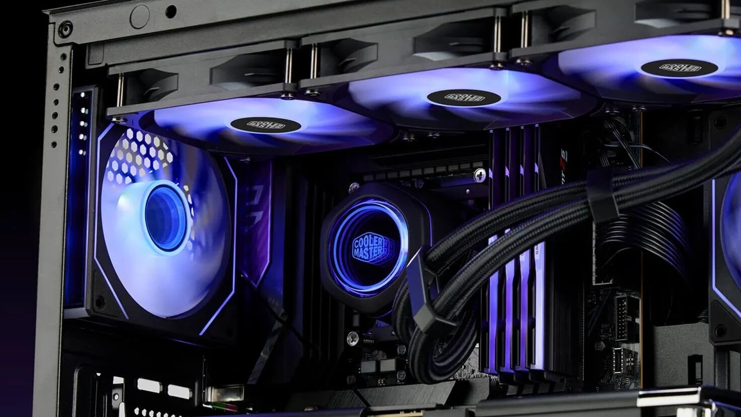 The image shows a close-up of the interior of a Cooler Master HAF II 500 case, focusing on its cooling fans and internal components.