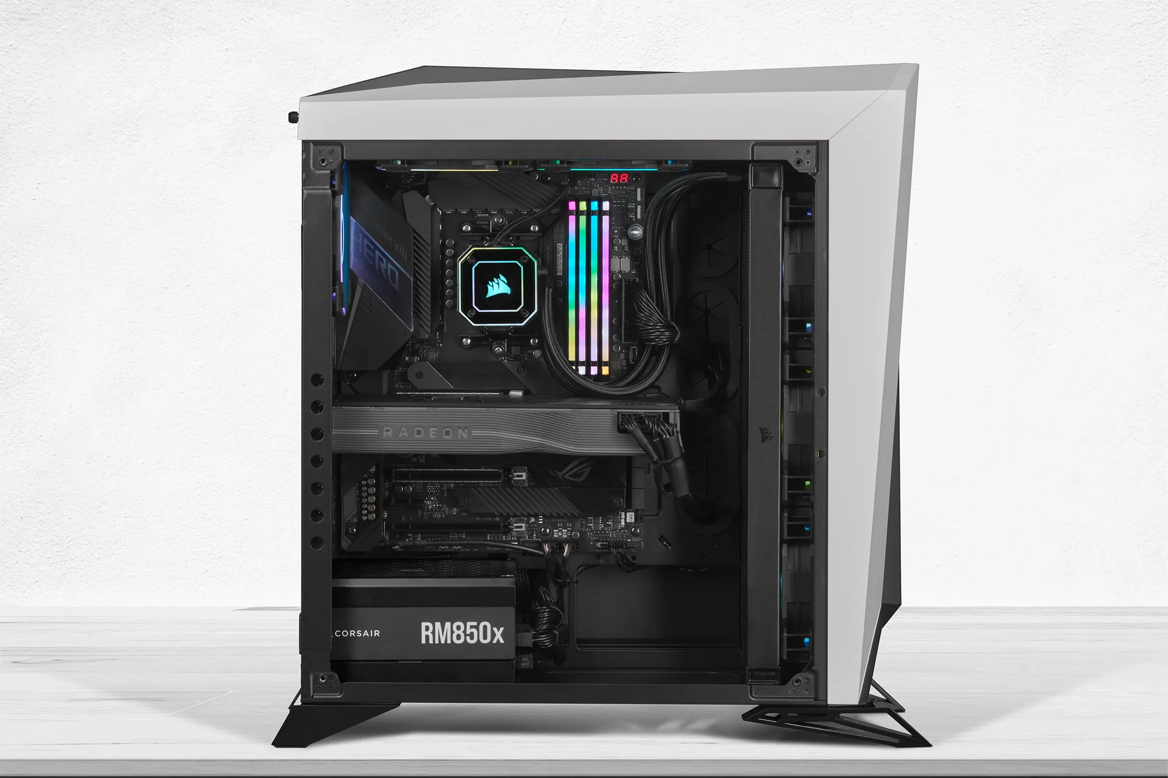A side profile of a Corsair RM850x power supply unit installed in an open computer case.