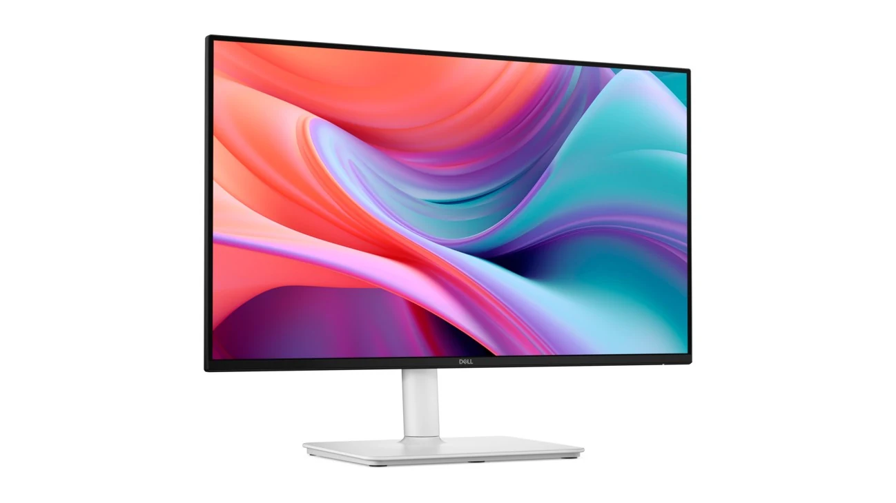A Dell monitor with a white stand and a colorful abstract wallpaper displayed on the screen.