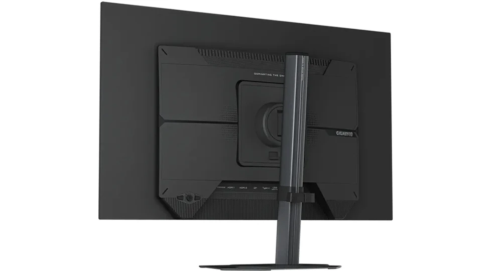 The back of the Gigabyte GO27Q32 with the port row (HDMI, DisplayPort, USB-C, USB) and the stand column.