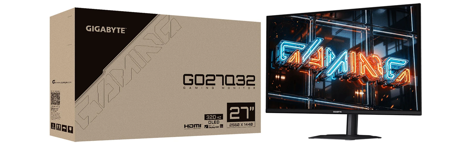 The Gigabyte GO27Q32 retail box next to the monitor.