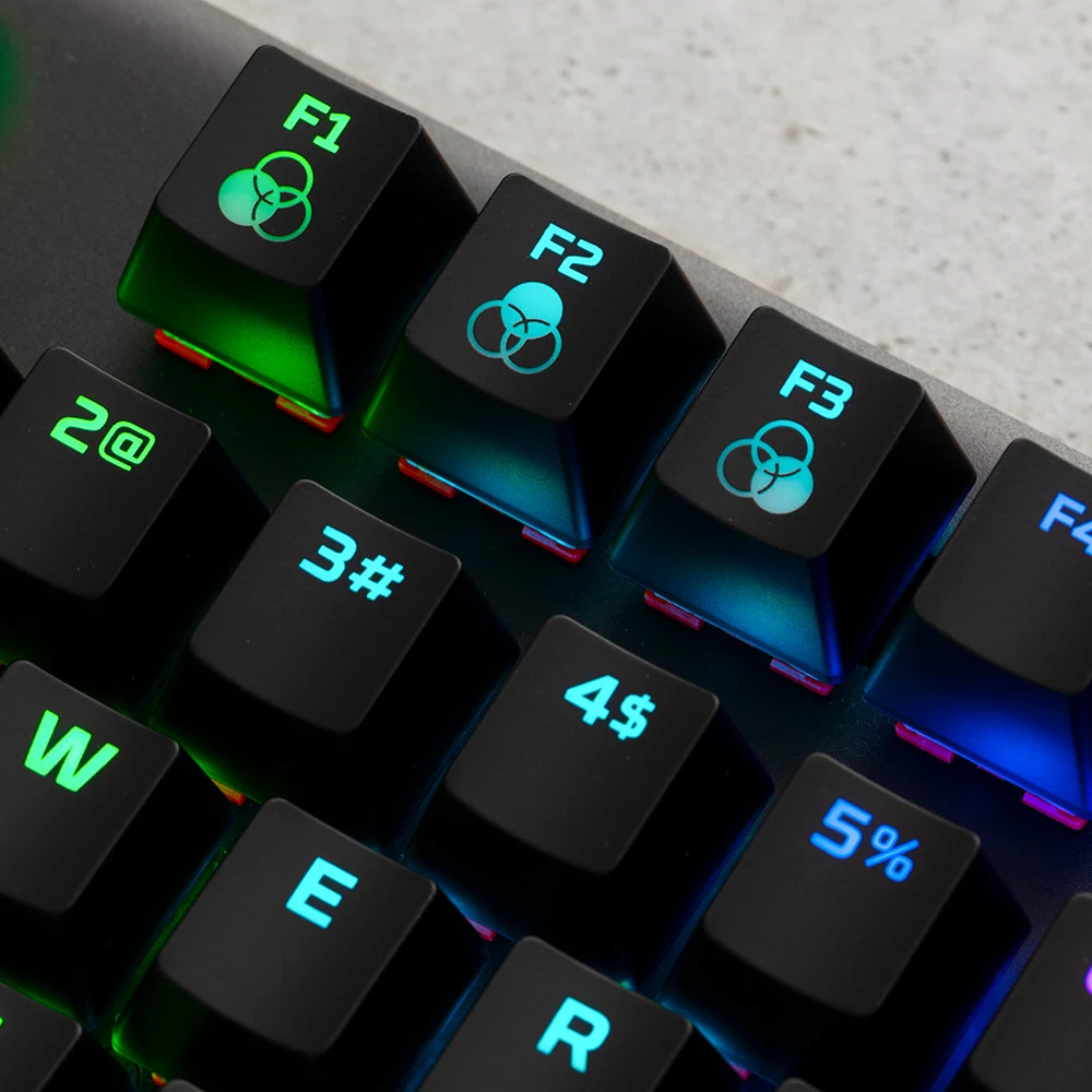 A close-up of a black keyboard with colorful backlighting and illuminated keycaps showing various symbols and numbers.