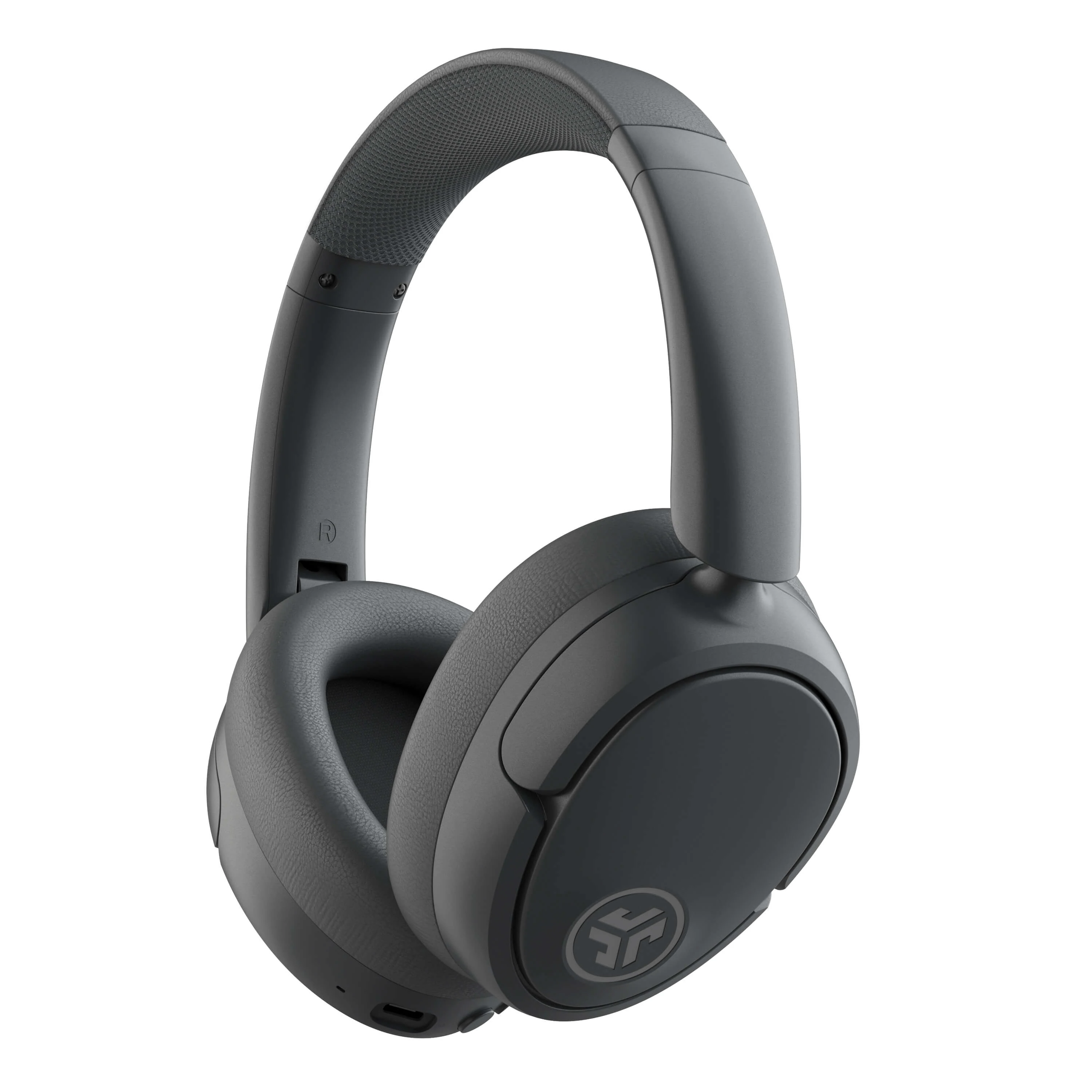 A close-up side profile of a black over-ear headphones with a textured earcup and a logo on the right earpiece.