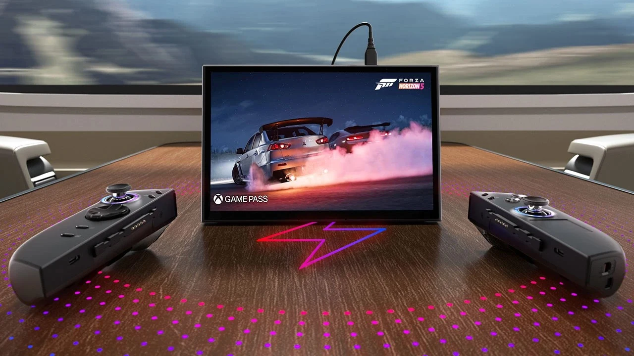 The Lenovo Legion Go 2 with both Legion TrueStrike controllers detached, its 8.8-inch OLED screen standing on its kickstand on a table.