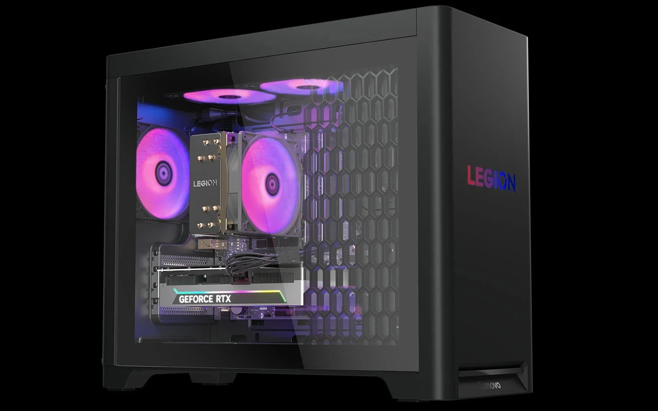 The Lenovo Legion Tower 5-2026 is shown from a three-quarter angle, highlighting its black finish and RGB-lit interior components.
