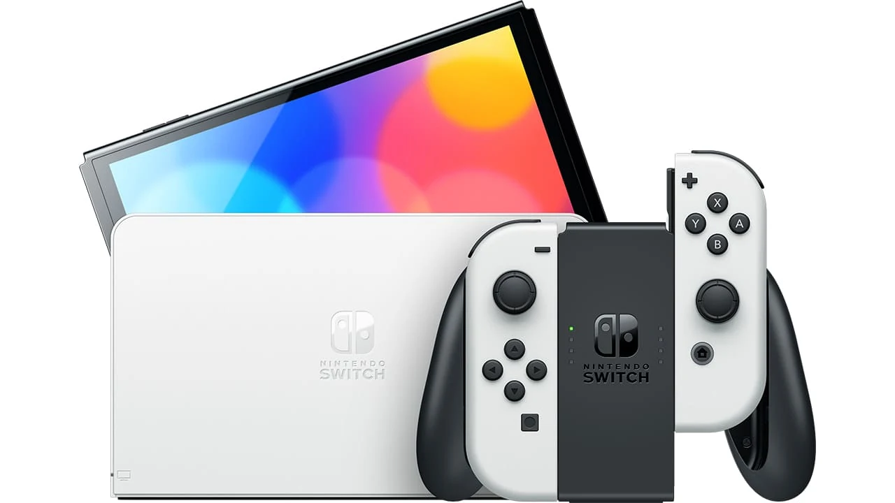 The Nintendo Switch OLED Model with White Joy-Con Controllers is shown in a three-quarter angle, highlighting the console and controllers against a white background.