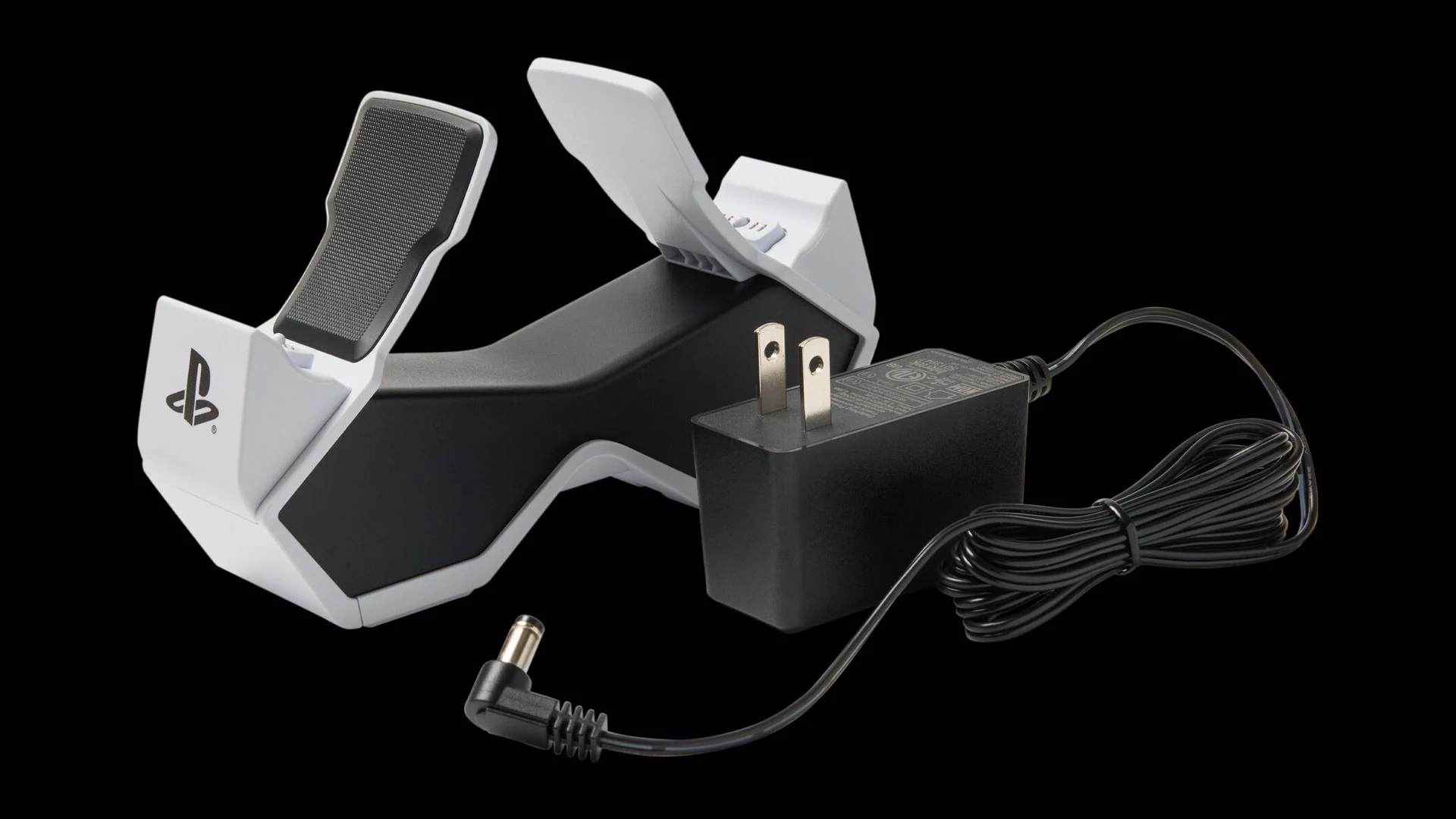 A PlayStation-branded dual charging station with a black and white color scheme, shown from the front.