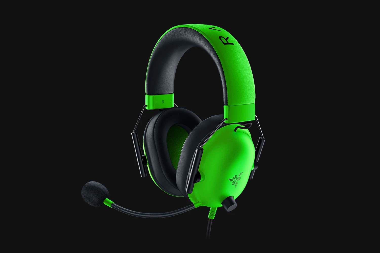 A green and black Razer BlackShark V2 X headset with a microphone, shown from the side.