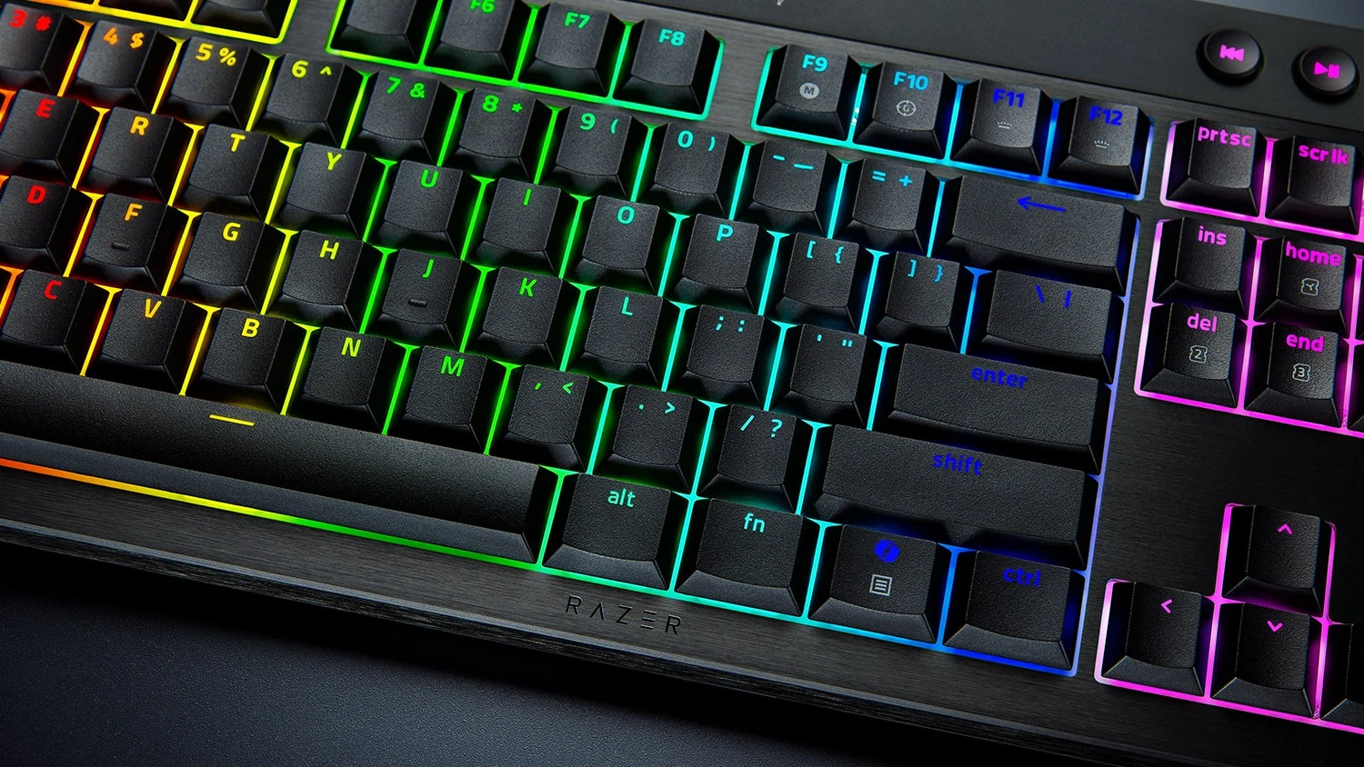 A close-up of a Razer BlackWidow V4 Low-Profile HyperSpeed keyboard with multi-colored backlighting.