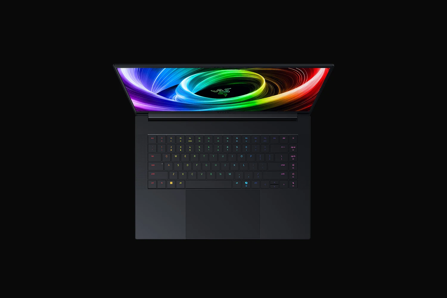 A top-down view of a black Razer Blade 16 gaming laptop with a vibrant, colorful screen display.