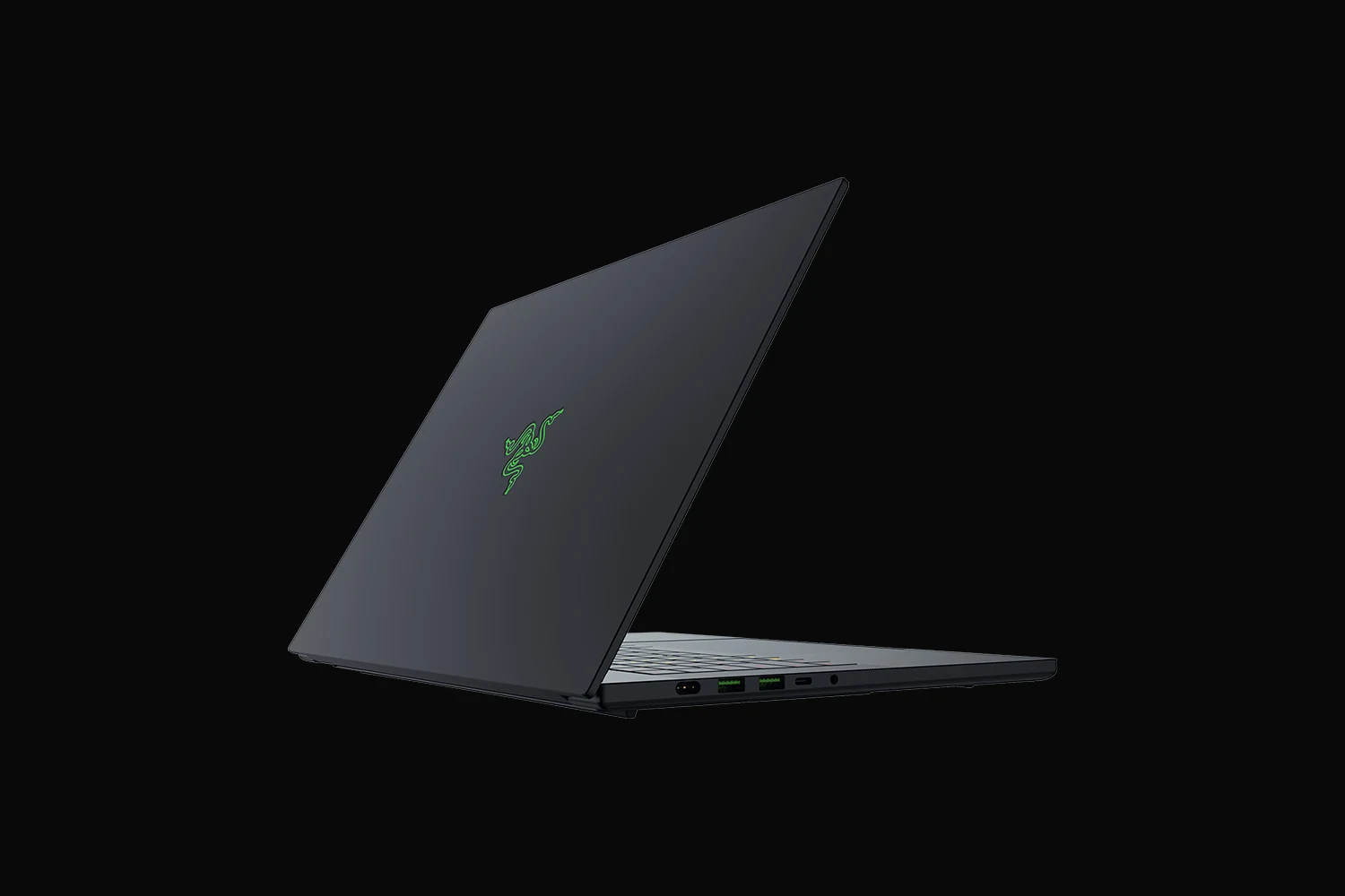 The Razer Blade 16 is shown in a three-quarter view, angled slightly to the left. The laptop's lid features the green Razer logo prominently on its surface.