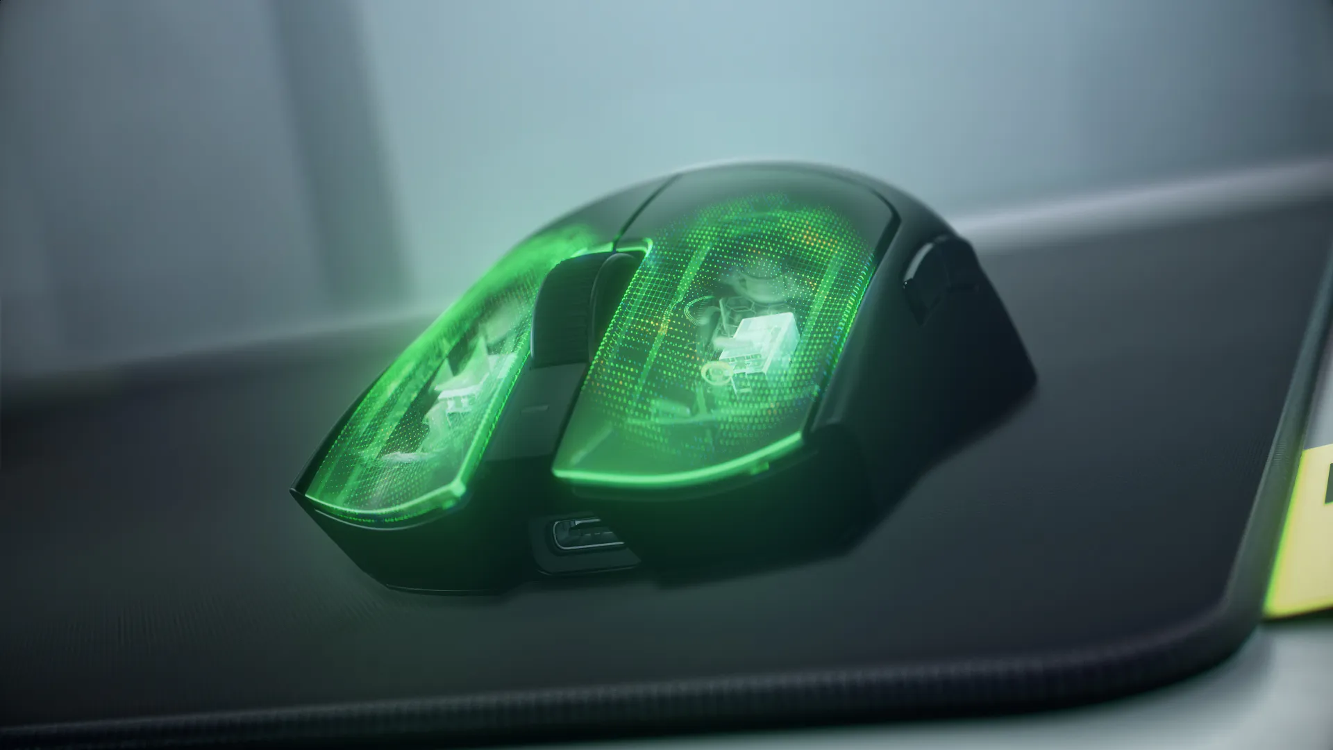 The Razer Viper V4 Pro Wireless mouse is shown in a side profile, resting on a black surface with green lighting emanating from its scroll wheel area.
