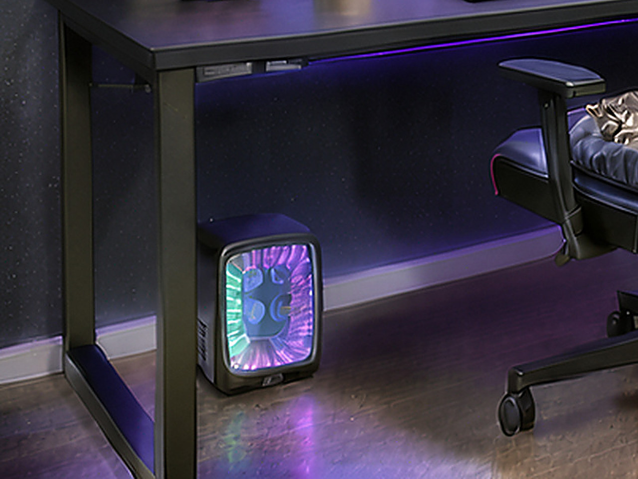 Close-up of the slate mini refrigerator with colored LED interior lighting and a carrying handle