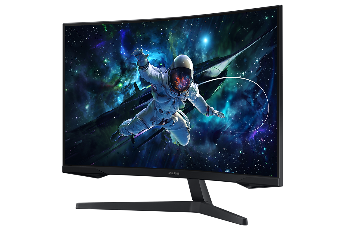 A Samsung monitor with a curved screen displaying an astronaut in space, viewed from the side.