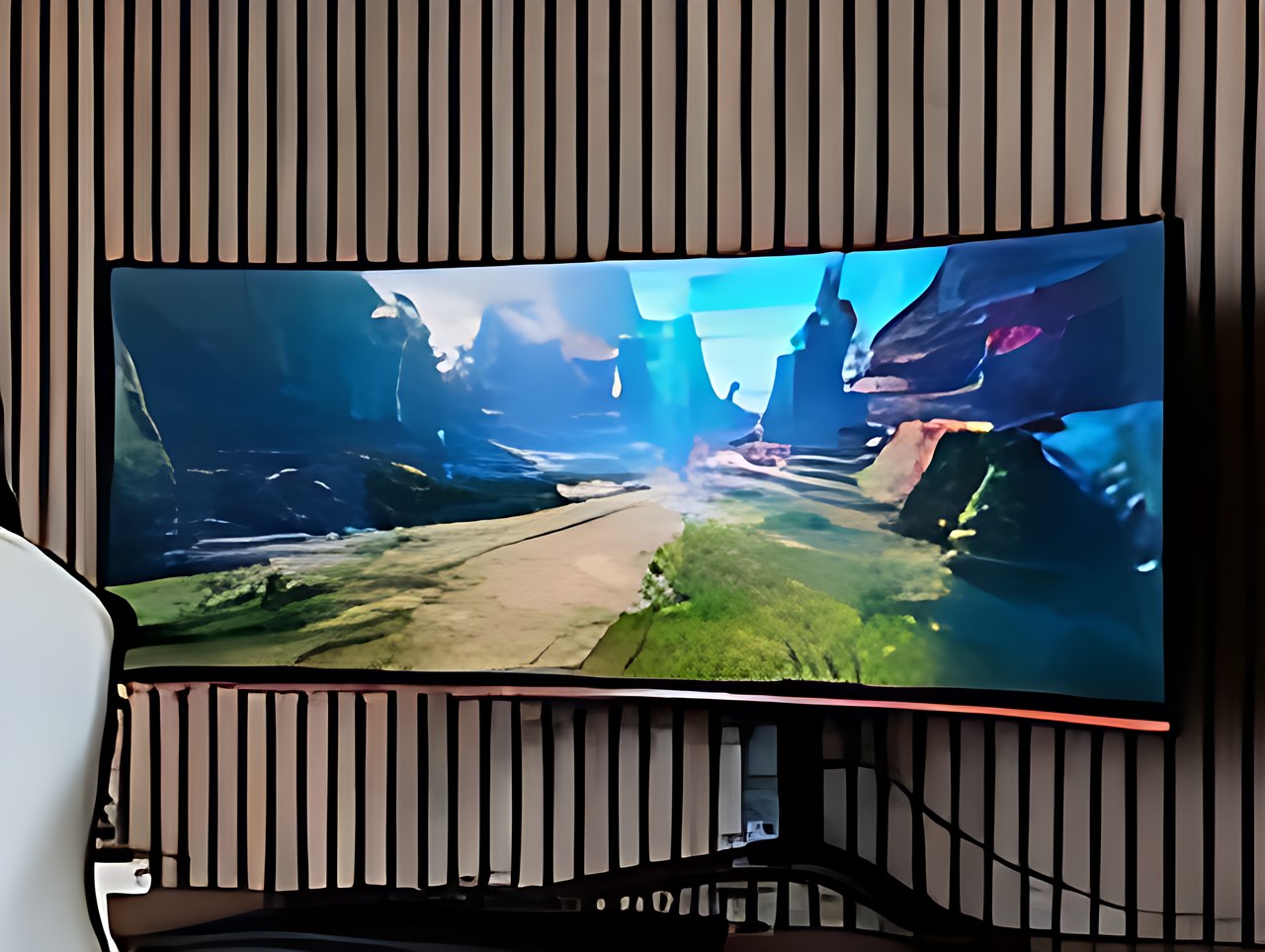 Samsung 34' Odyssey G5 Ultra-Wide Gaming Monitor with 1000R Curved Screen in the gray gamer room setup scene