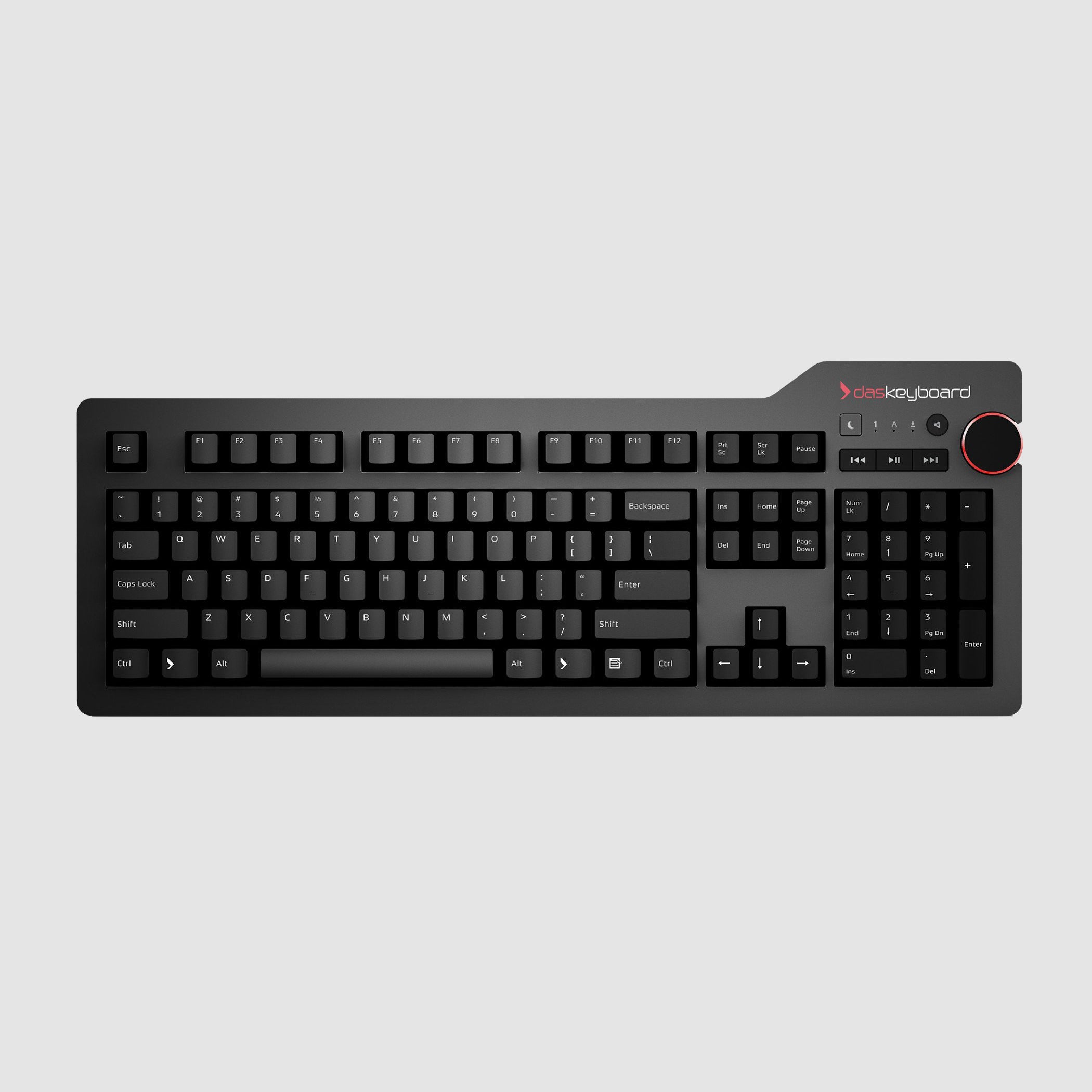 A top-down view of a black Das Keyboard 4 Root Wired Mechanical Keyboard with visible keycaps and a red logo in the upper right corner.