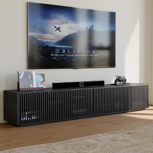 POVISON 95 inch black slatted mid century modern TV stand under a wall mounted TV, Amazon listing image