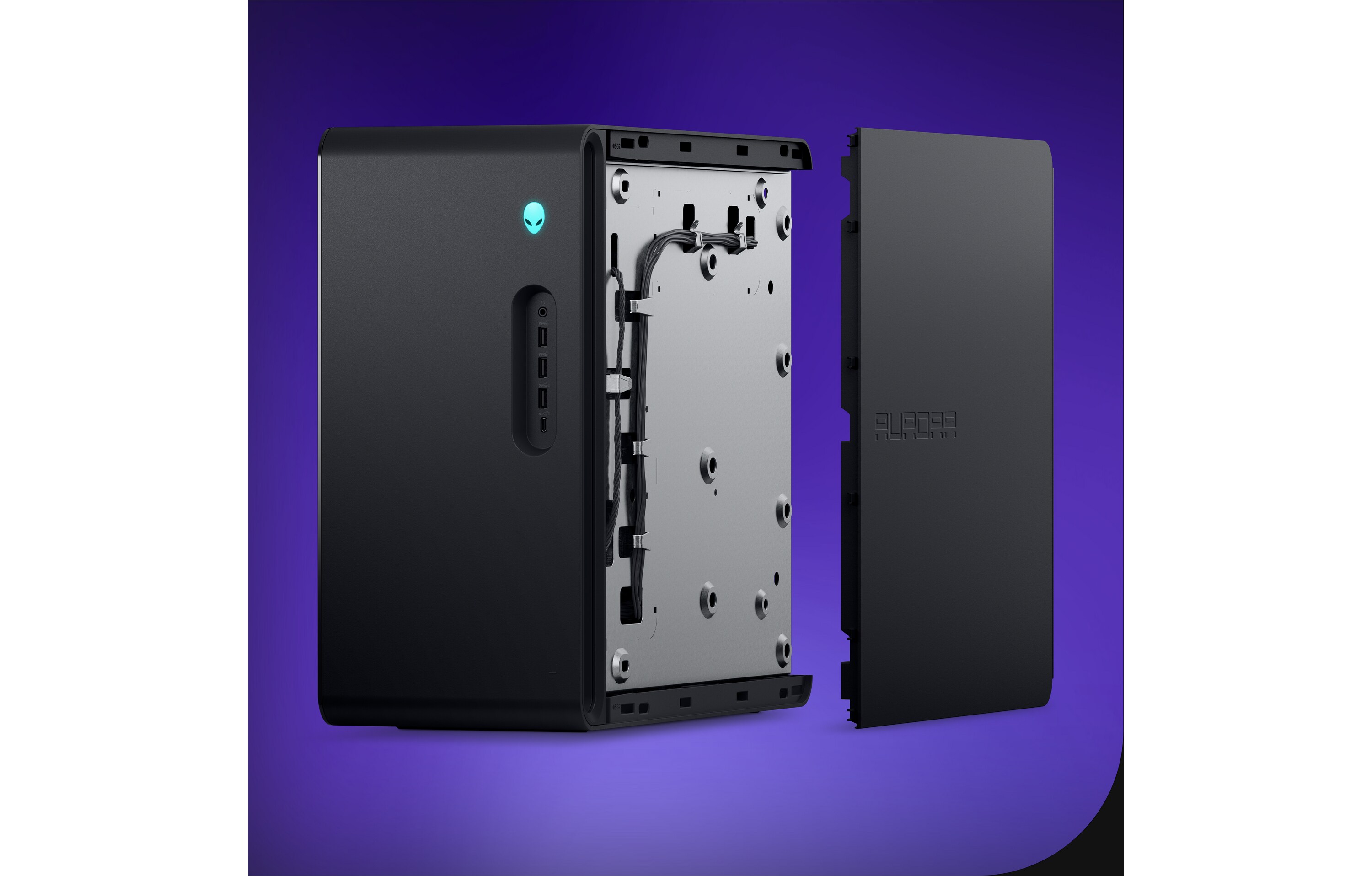 The Alienware Aurora Gaming Desktop is shown from behind, with its rear panel and back cover removed to reveal the internal components.