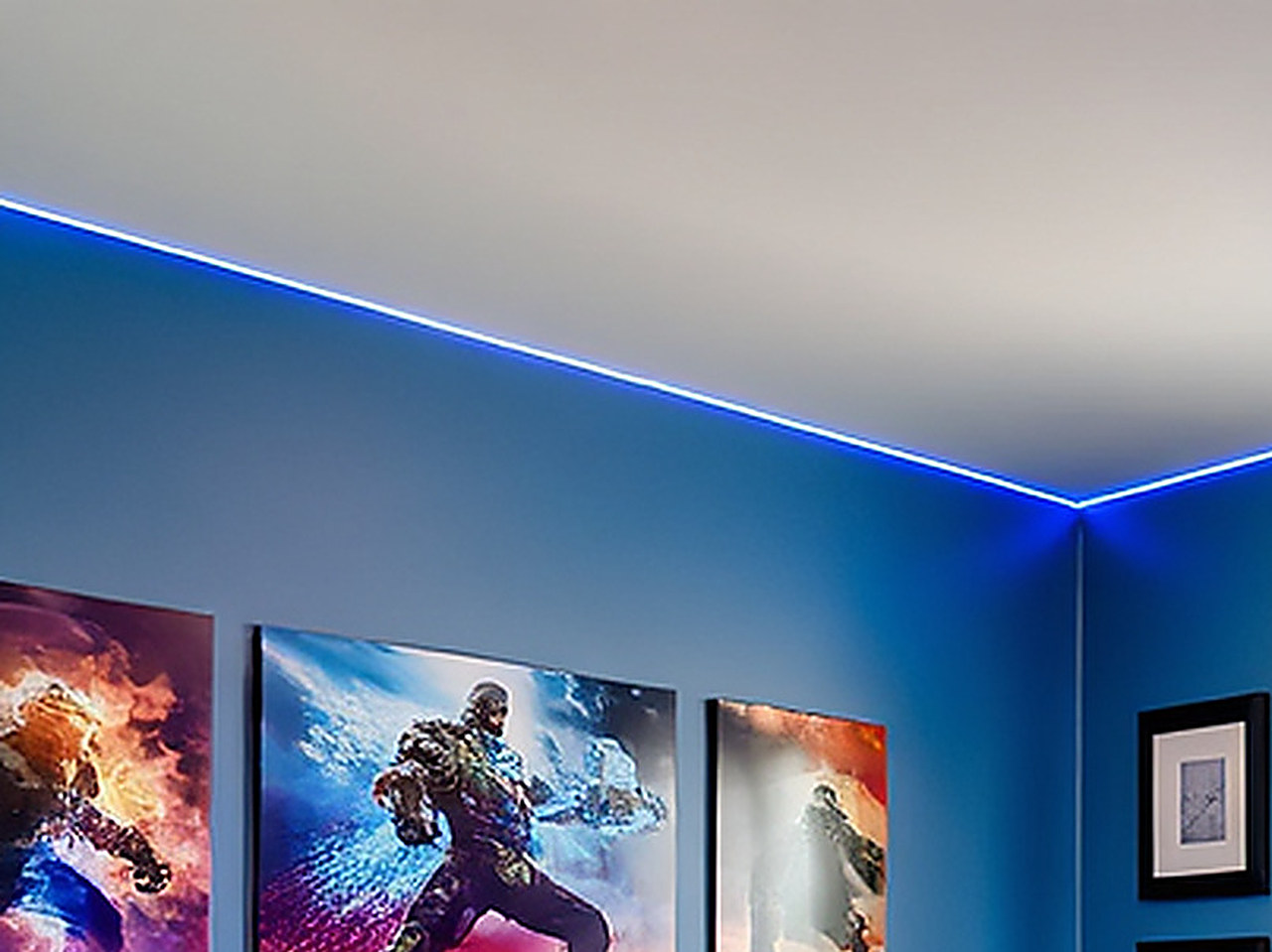 Close-up of the hidden LED strip casting a cool blue ambient glow along the ceiling edge.