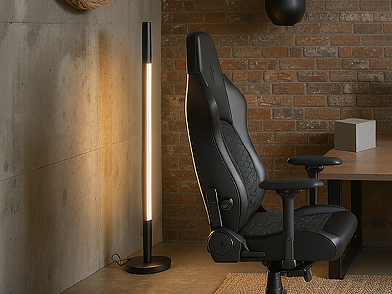 Close-up of the minimalist black floor lamp with a circular base.