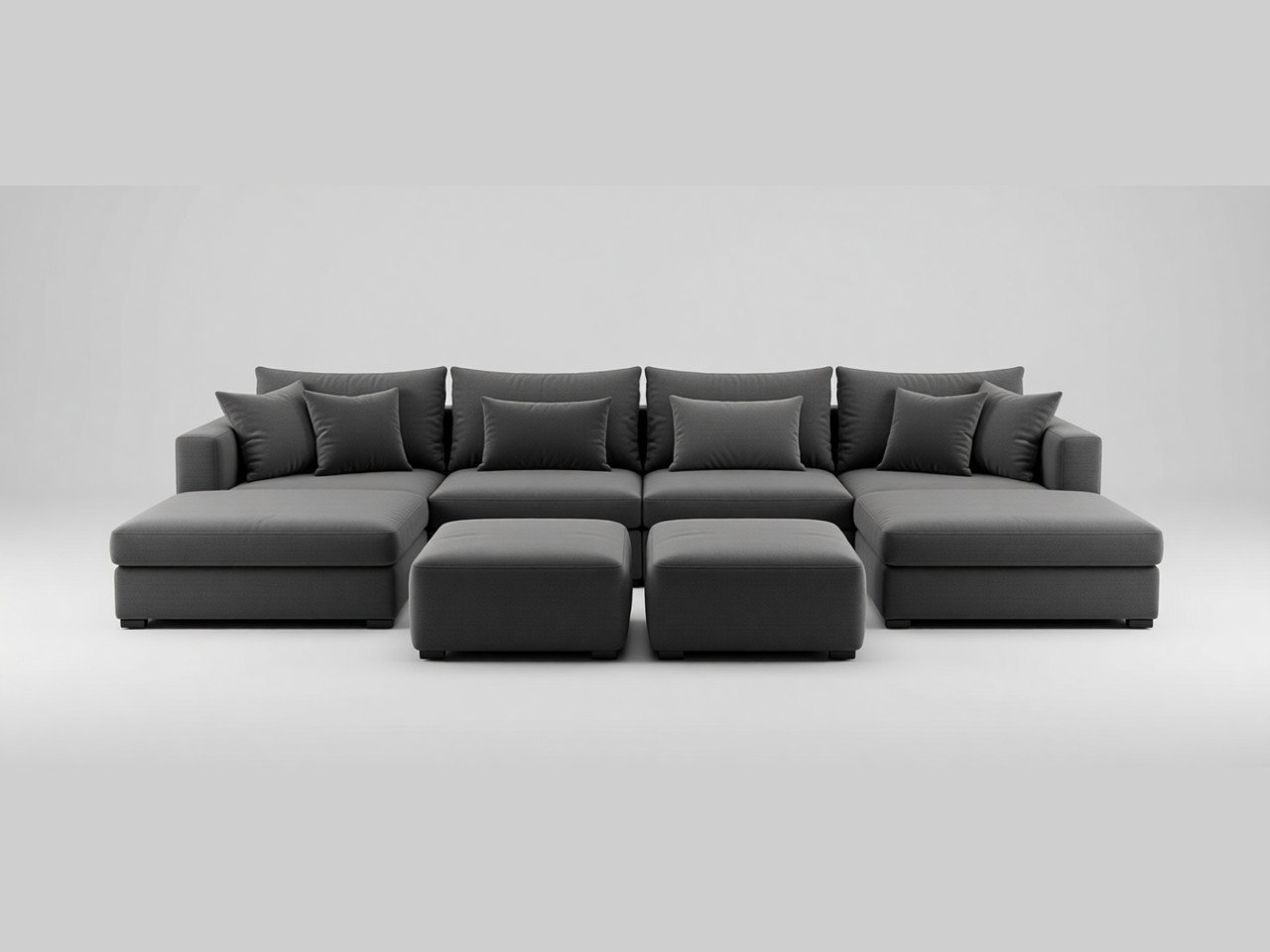 Grey six-seat modular sectional with deep cushions and two ottomans, shown on a plain grey background.