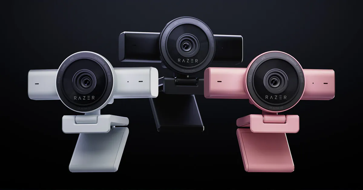 The Razer Kiyo V2 webcams are shown in three different color variants: white, black, and pink.