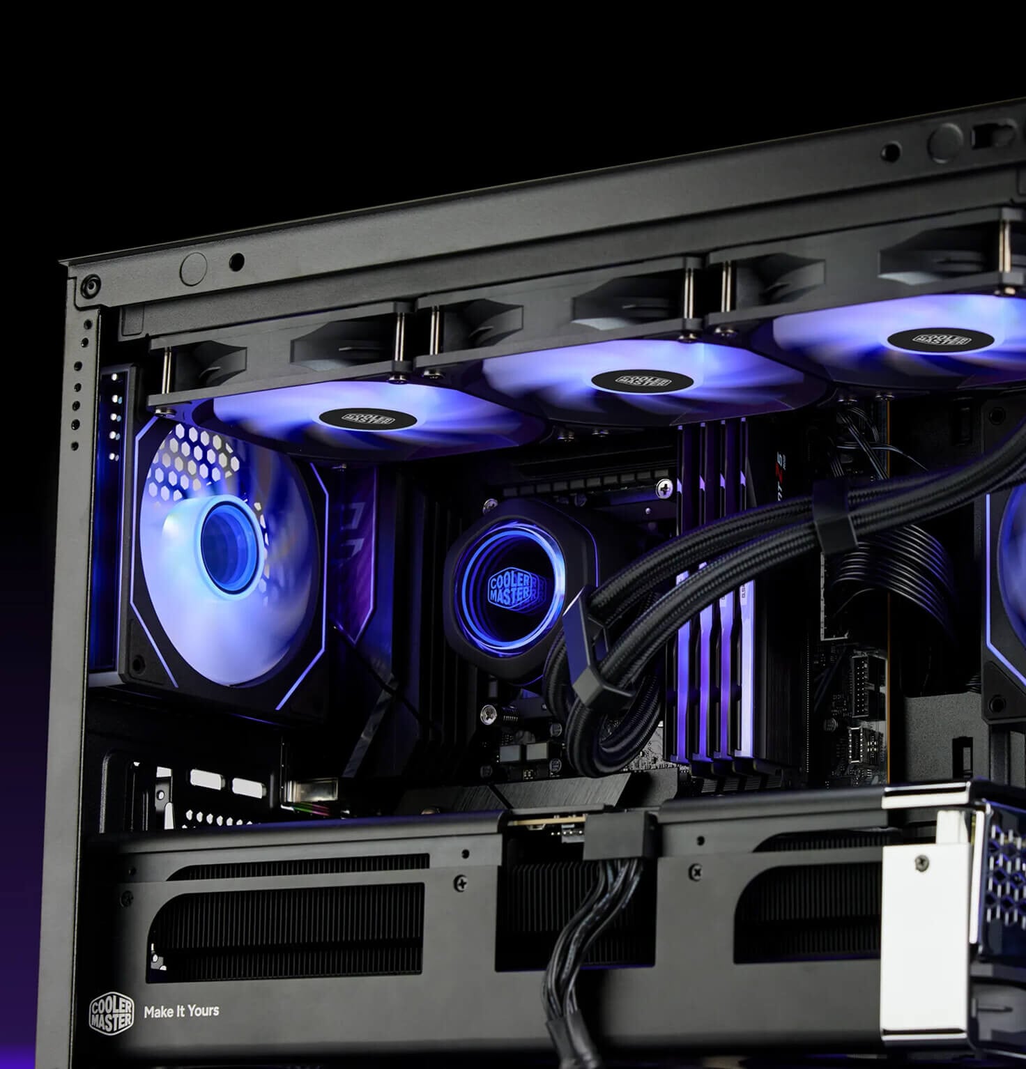 The image shows a close-up of the interior of a Cooler Master HAF II 500 case, focusing on its cooling fans and internal components.