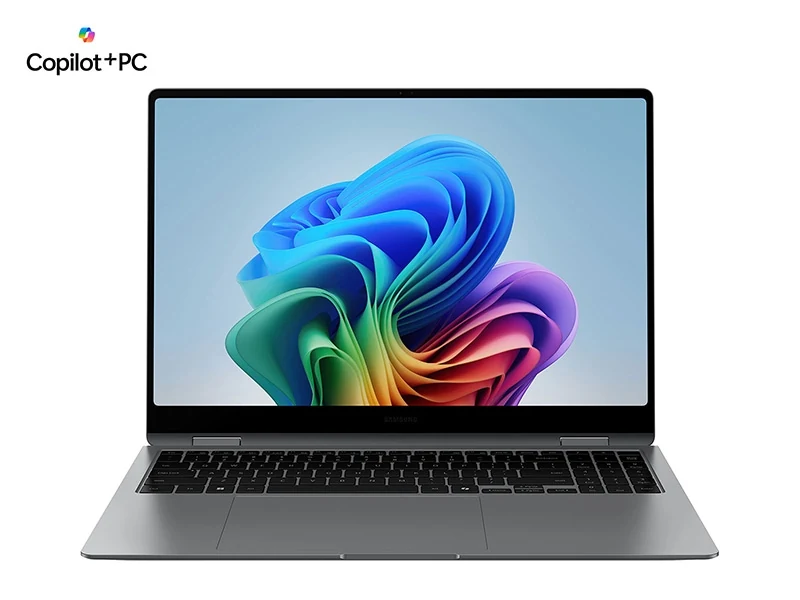 A silver Samsung Galaxy Book5 Pro 360 Copilot+ PC in a side profile view, showcasing its thin bezels and keyboard.